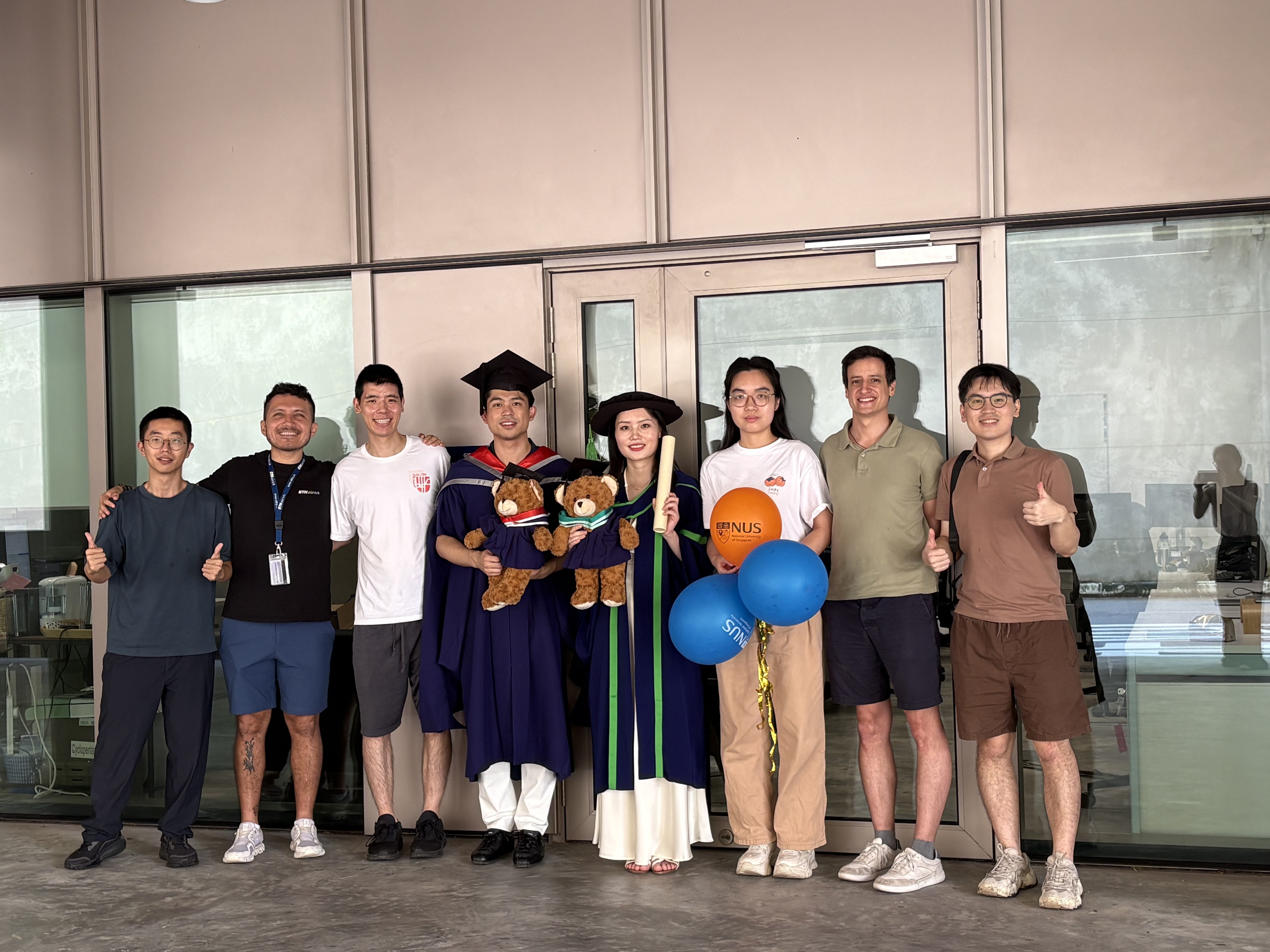 NUS Commencement Class of 2026 for PostDoc Wenpei Li's PhD and RA Haoxi Yuan's master's graduation